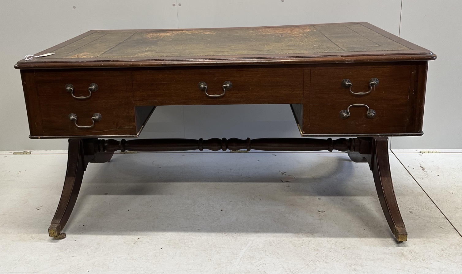 A Victorian mahogany kneehole writing table, width 148cm, depth 80cm, height 77cm